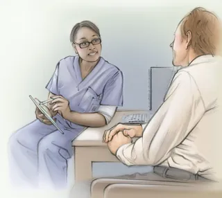 Healthcare professional discussing with a patient in a medical office