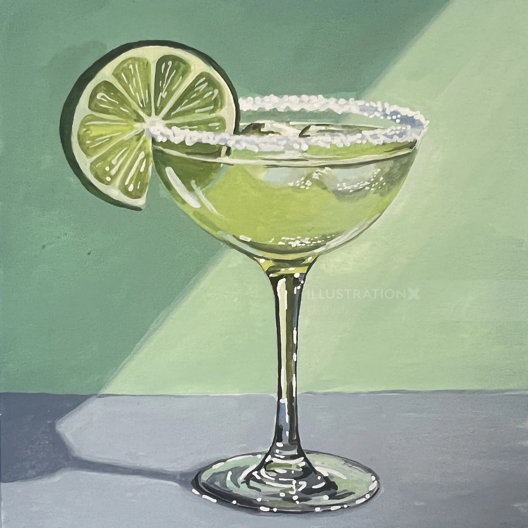 Margarita cocktail in a glass with salted rim and lime garnish