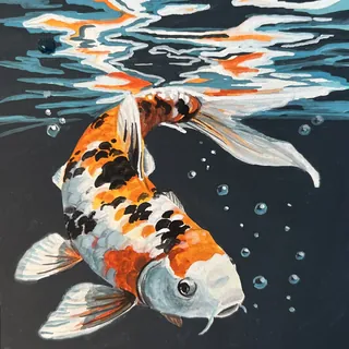 Koi fish with orange, black, and white patterns swimming underwater