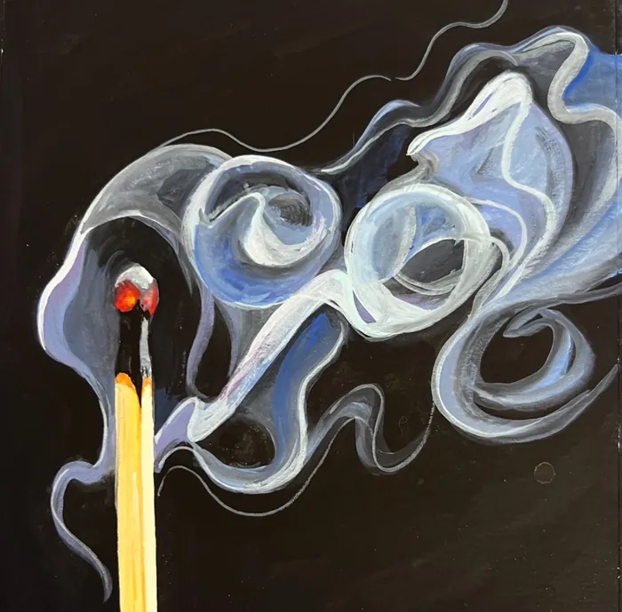 Lit matchstick emitting swirling smoke against black background