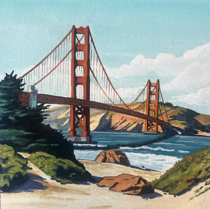 Golden Gate Bridge over water with rocks and greenery in foreground