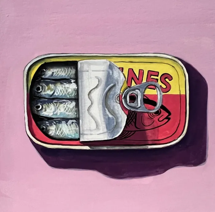 Open sardine tin with fish inside on purple background