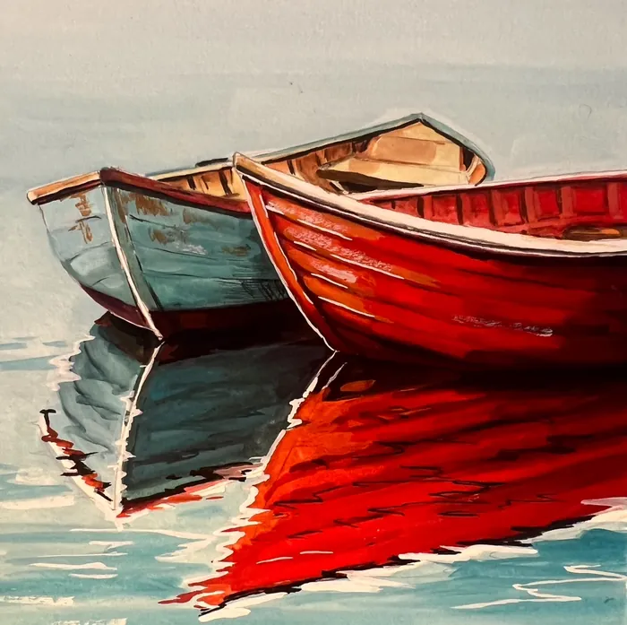 Two wooden boats with red and blue paint floating on water