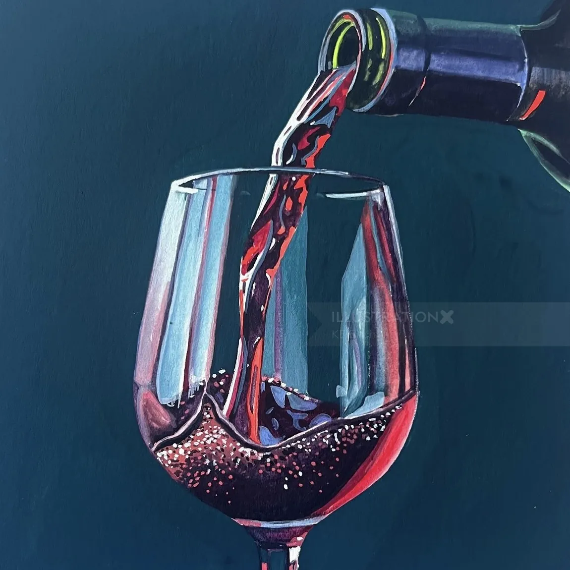 Glass of red wine being poured from bottle