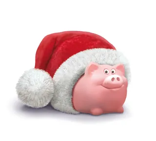 Pink piggy bank inside a red and white Santa Claus hat by Kai Klimiont