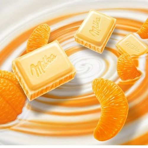 Milka chocolate squares with mandarin slices on creamy swirl by Kai Klimiont