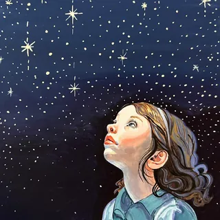 Girl looking up at stars in a dark night sky
