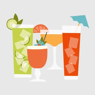 Colorful summer cocktails with ice and garnishes by Kate Snell