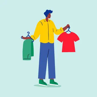 Person holding two clothes on hangers, deciding what to wear