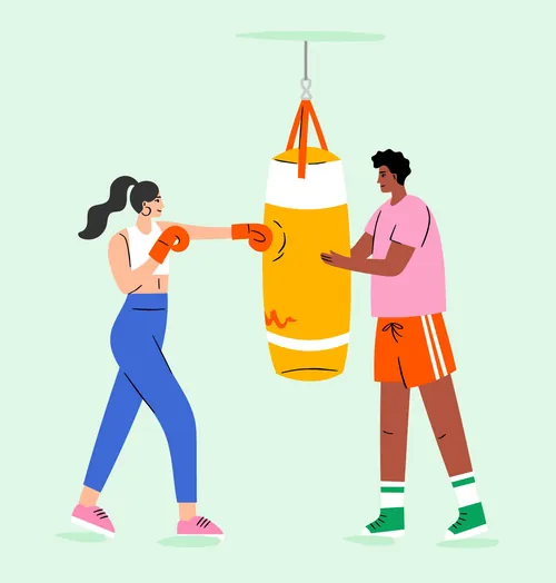 Woman boxing and man coaching with punching bag by Kate Snell