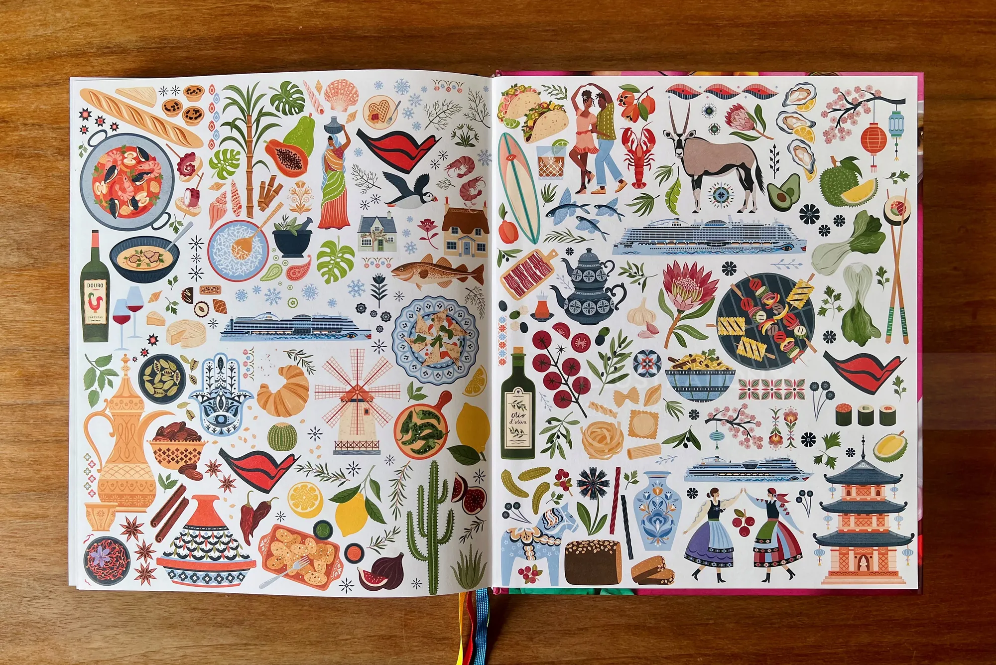 Colorful illustrated book spread by Kate Snell with animals, plants, and objects