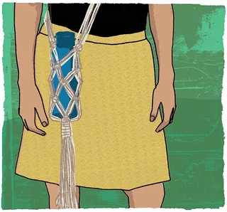 Person in yellow skirt holding blue glass in white macrame holder by Kavel Rafferty