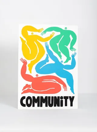 Colorful abstract figures intertwined above the word COMMUNITY