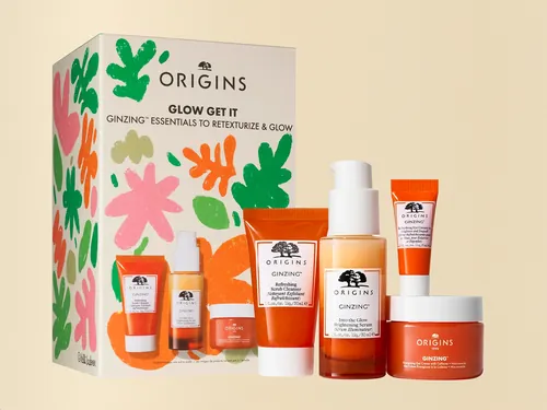 Origins skincare product packaging with colorful floral design