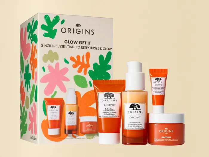 Origins skincare product packaging with colorful floral design