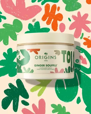 Origins Ginger Souffle skincare jar with colorful leaf patterns