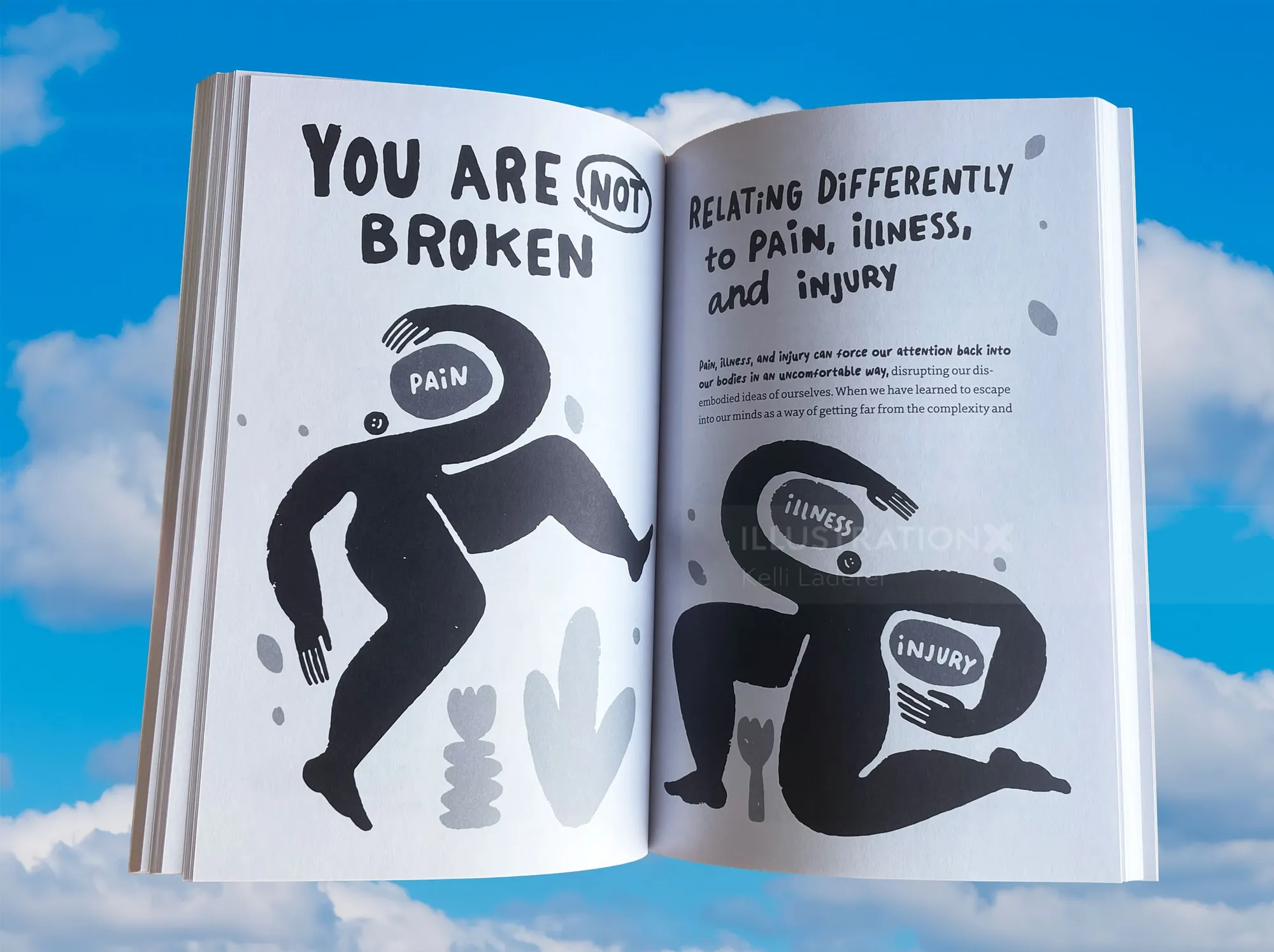 Open book with illustrations about pain, illness, and injury with motivational text