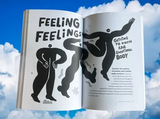 Open book showing black and white abstract figures with emotional body text