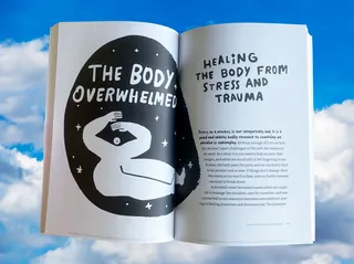 Open book showing illustrated body and text on healing stress and trauma
