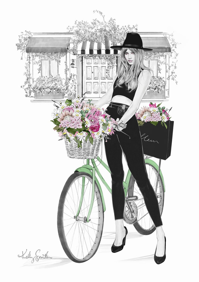 woman with flowers on bicycle
