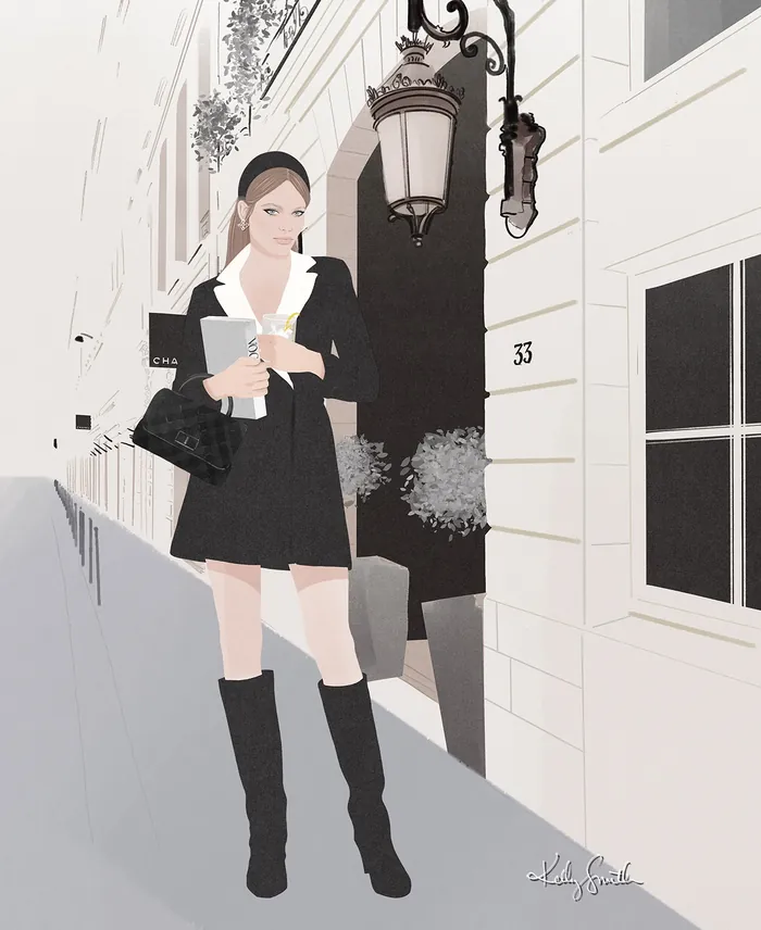 Young woman in black dress and boots holding coffee on Paris street