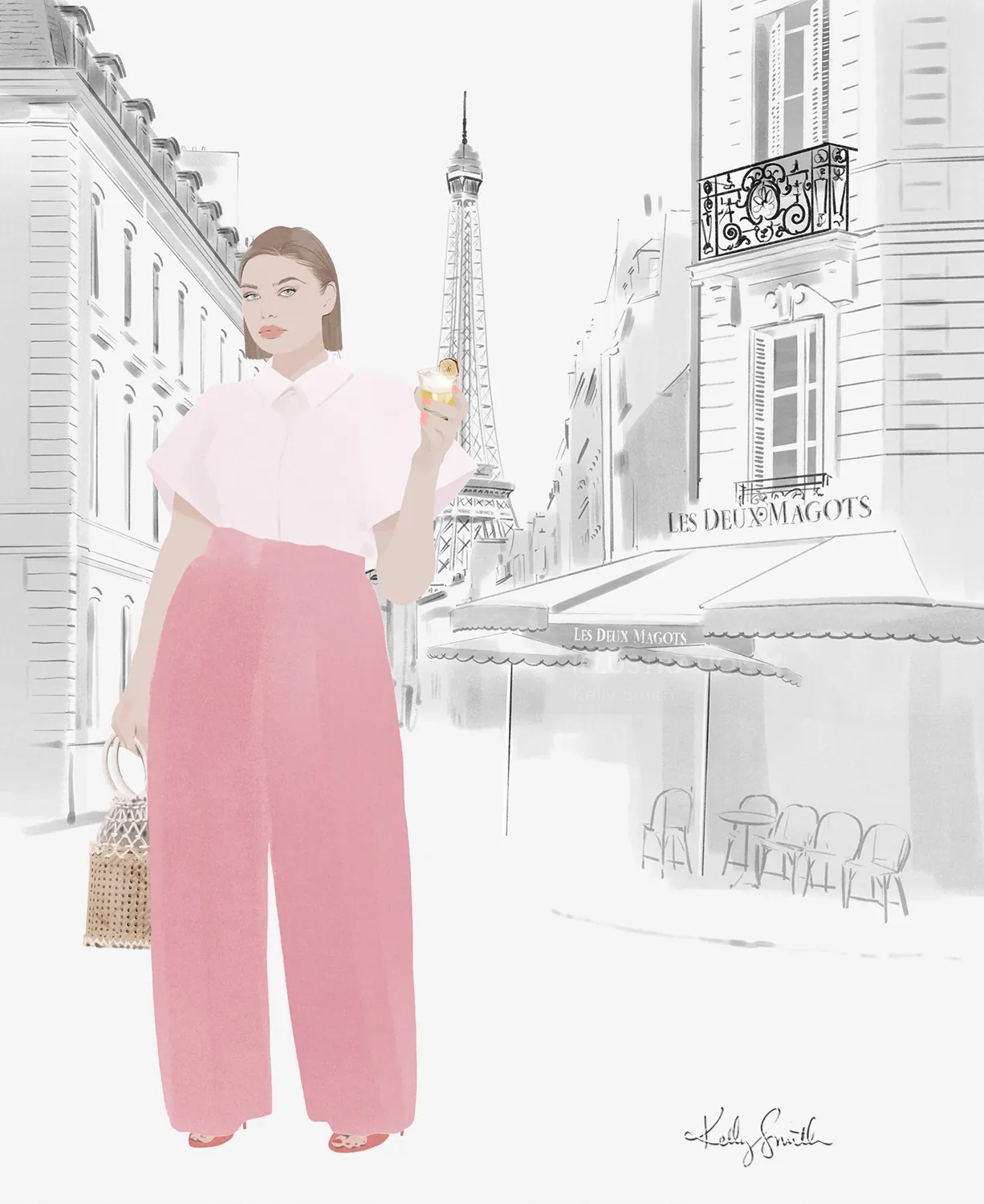 Woman in pink pants holding a cocktail near the Eiffel Tower in Paris
