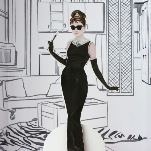 Illustration of Audrey Hepburn paper doll in black dress by Kelly Smith