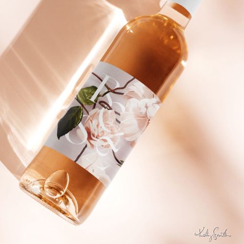 Wine bottle with a floral label design by Kelly Smith