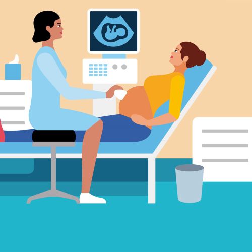 Pregnant woman having an ultrasound scan in a medical office by Klaus Meinhardt