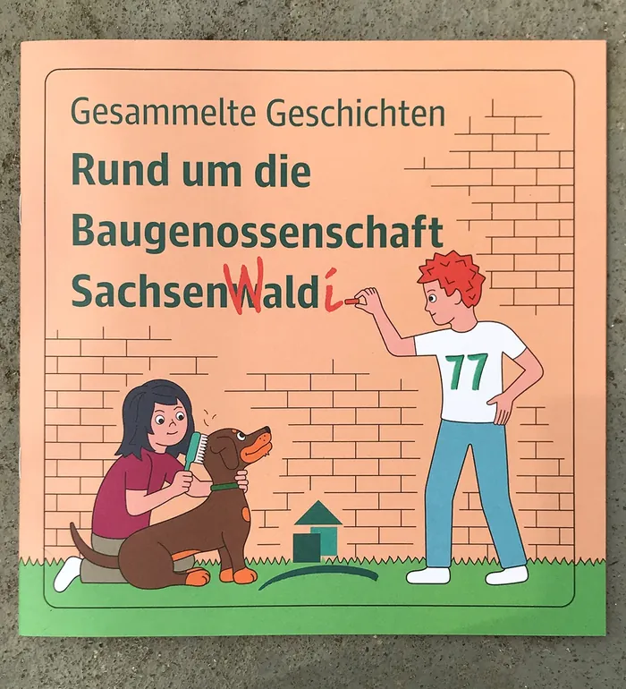 Two people with a dog near a brick wall with German text about Baugenossenschaft Sachsenwald.