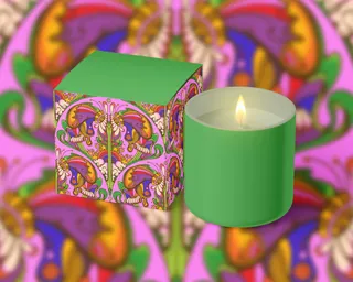 Green candle and colorful psychedelic box with butterflies and flowers
