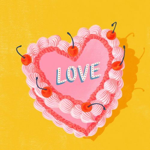 Heart-shaped pink cake with cherries spelling love