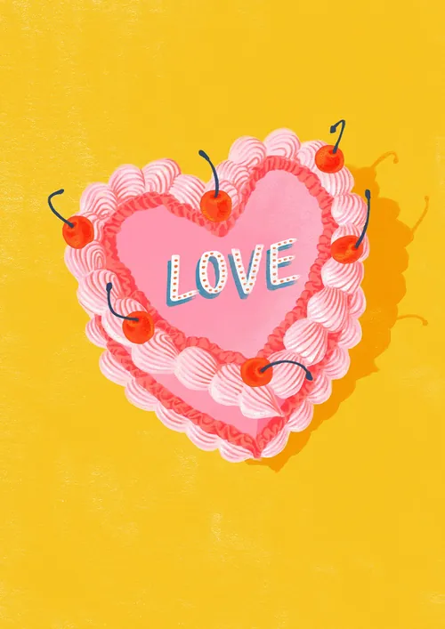 Heart-shaped pink cake with cherries spelling love