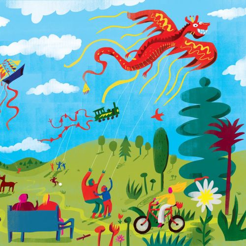 People flying kites and enjoying a sunny day in a vibrant park
