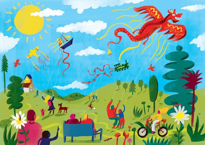 People flying kites and enjoying a sunny day in a vibrant park