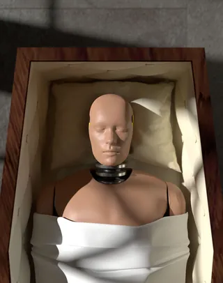 3d model of crash test dummy lying in coffin by Lee Montgomery