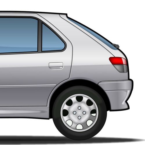 Side view of a silver Peugeot hatchback car by Lee Montgomery