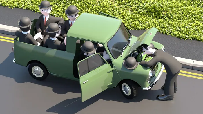 Mini pickup truck broken down with toy figures, artist Lee Montgomery