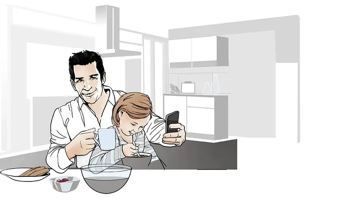 Father and daughter taking selfie in kitchen by Lennart Andresen
