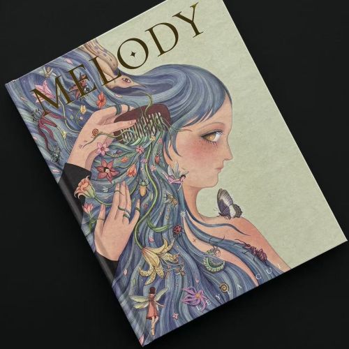 Cover of Melody artbook with blue-haired girl and small animals by Leyla Cui