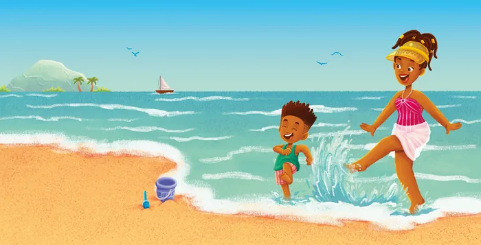 Two children joyfully playing and splashing in ocean waves on the beach.