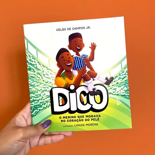 Book cover with two boys smiling at a soccer stadium