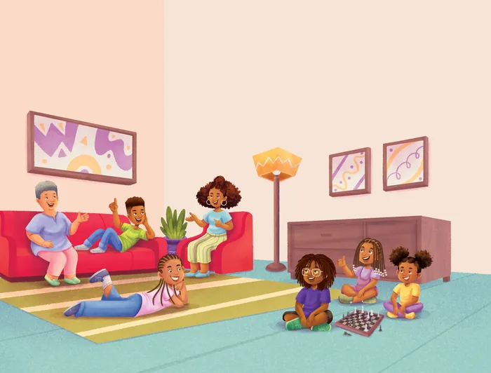 Family members sitting and playing together in living room