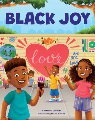 Happy Black children celebrating love and joy outdoors with colorful mural