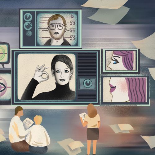Group observing facial recognition and eye scan images on screens.