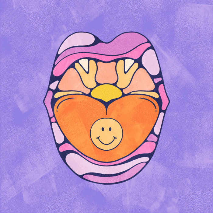 open mouth with brightly patterned lips, smiley face on tongue and sunset in the back of the mouth.