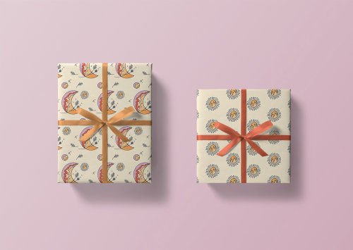 Bohemian inspired wrapping paper featuring a dandelion and moon repeat pattern and sunburst repeat p