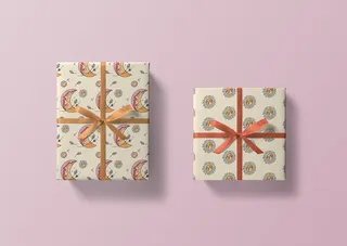 Bohemian inspired wrapping paper featuring a dandelion and moon repeat pattern and sunburst repeat p