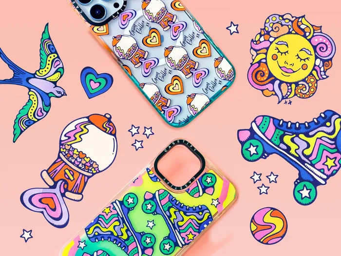 Colorful phone cases and retro stickers by Lively Scout on a pink surface