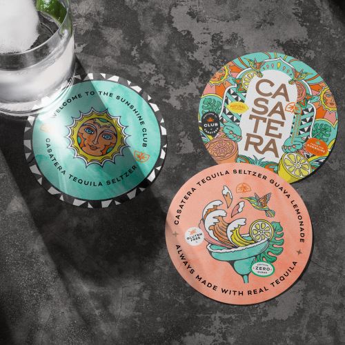 Three Casaterra tequila seltzer caps with vibrant artistic illustrations